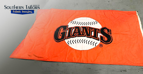 Picture of a Giants flag fabricated by Southern Tailors