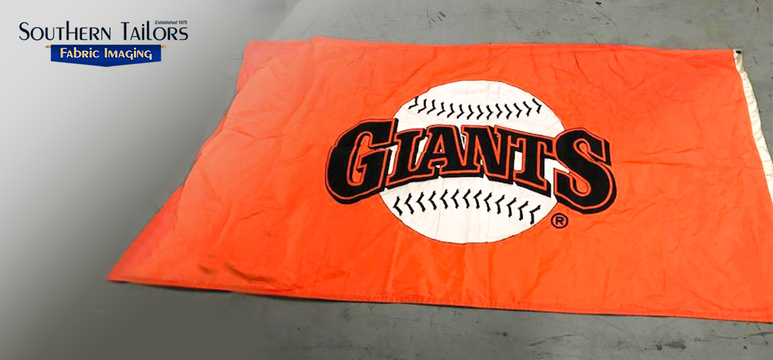 Picture of a Giants flag fabricated by Southern Tailors