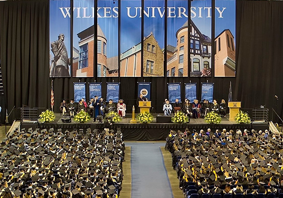 Picture of Graduation Ceremony Banner with Students